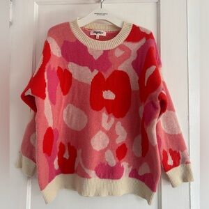 Colorful sweater worn a few times, perfect for Fall!